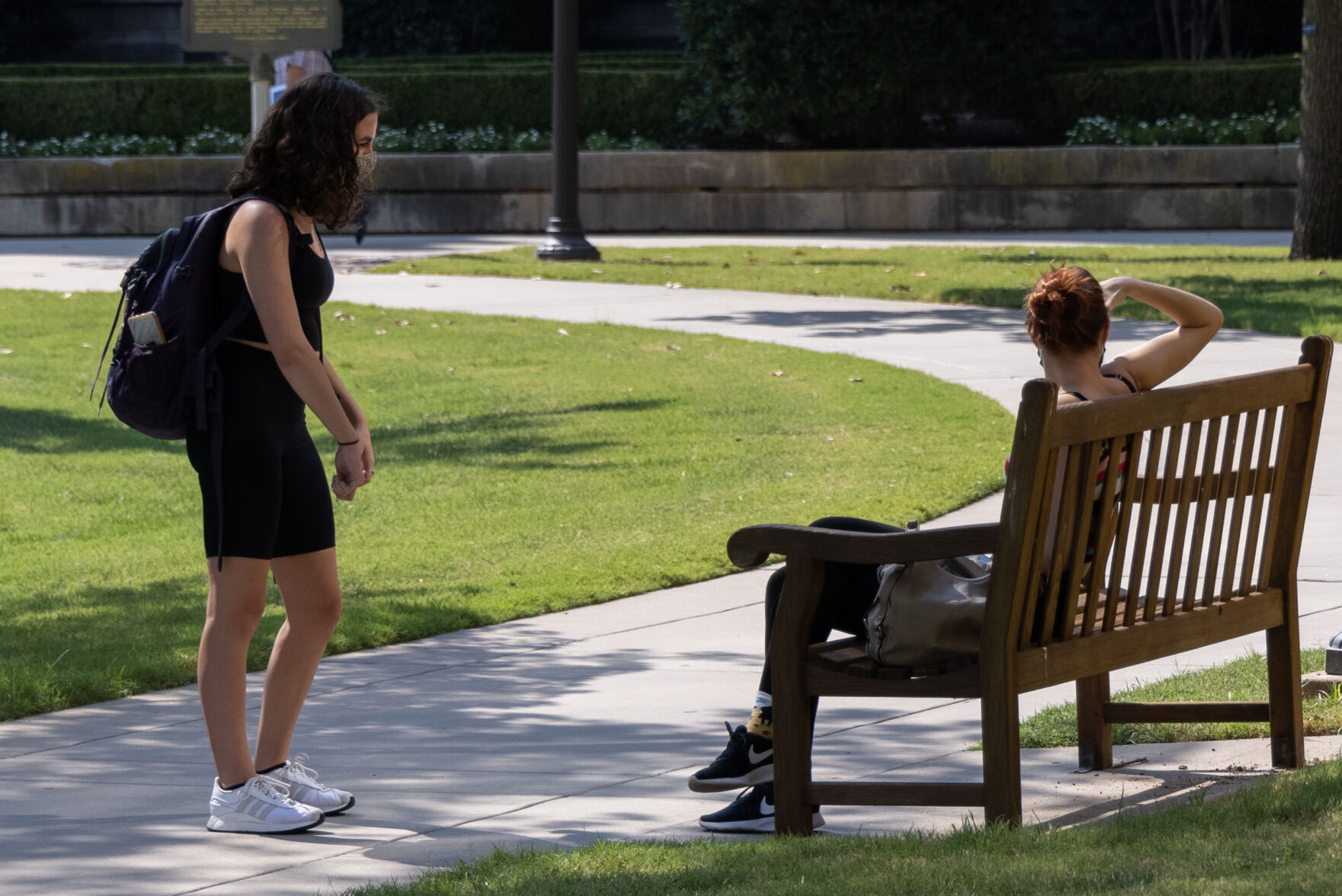 Students talk by Evans